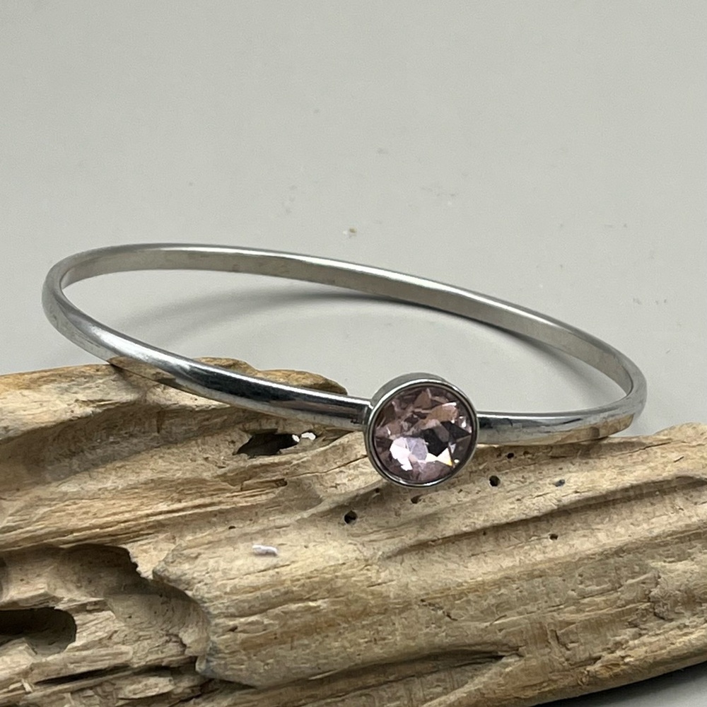 Elegant Silver Tone Bangle with Pink Gemstone-Elegant Everyday Accessory
